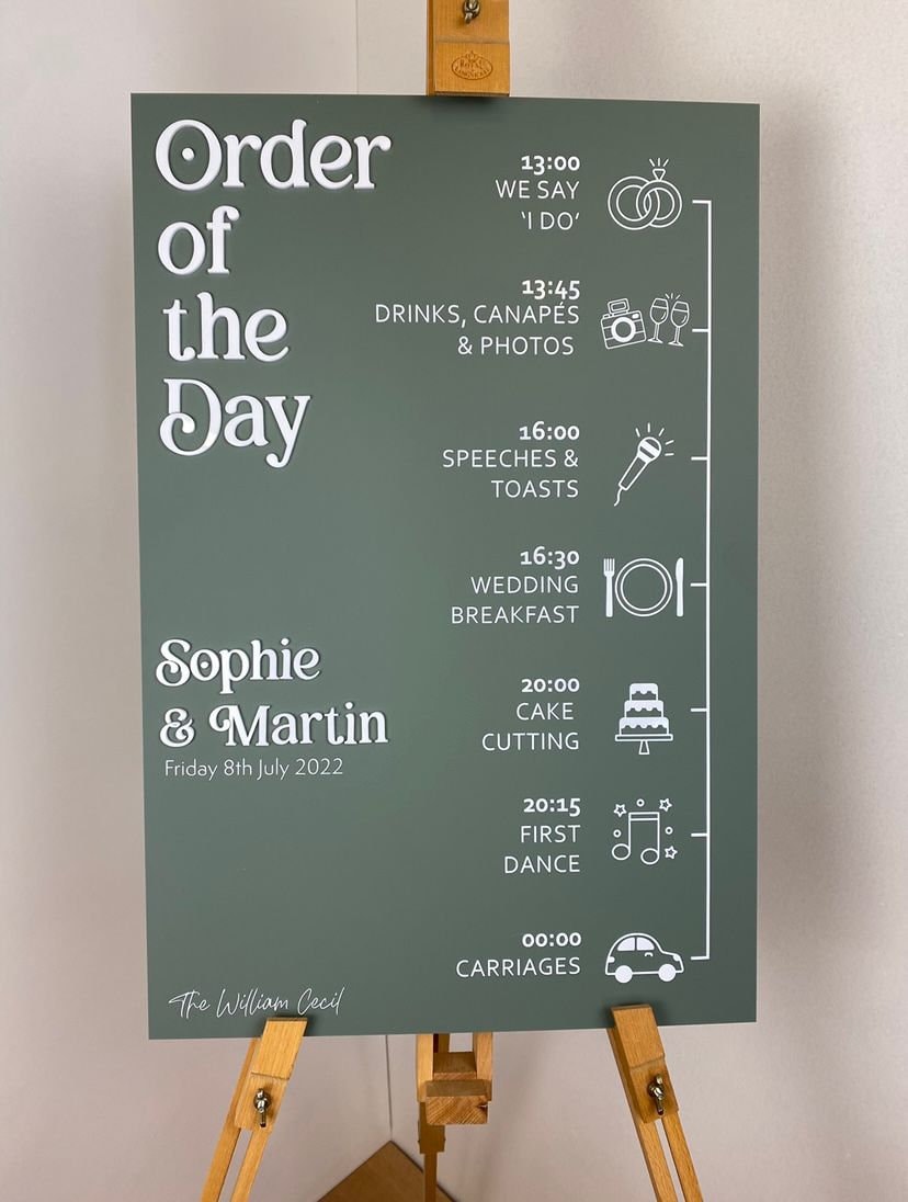 Rustic green and white acrylic order of the day wedding sign with a clear and organized schedule of events, including ceremony and reception, high-quality materials, perfect for guiding guests and adding a touch of elegance to your special day